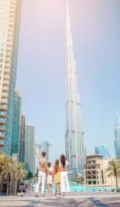 An expat family visiting Burj Khalifa in Dubai, UAE